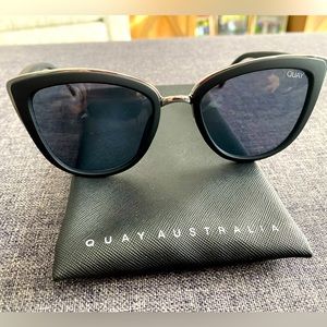 Black sunglasses by Quay Australia